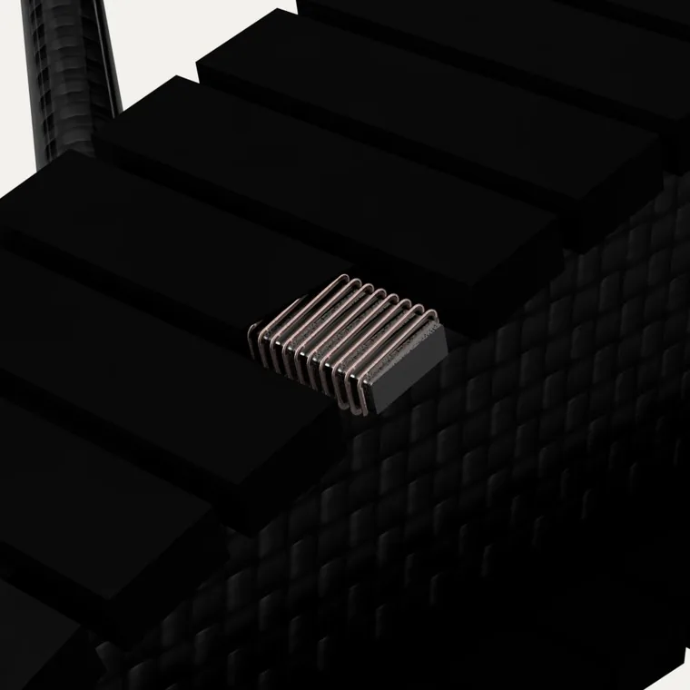 Close-up of an electro-permanent magnet module in the leading section of the track.